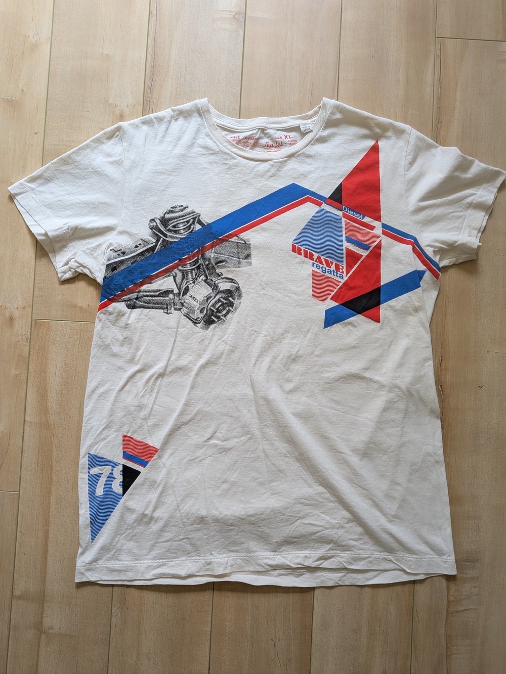 Vintage Womens Diesel White Short Sleeve Tee with Red & Blue Graphic. Designer